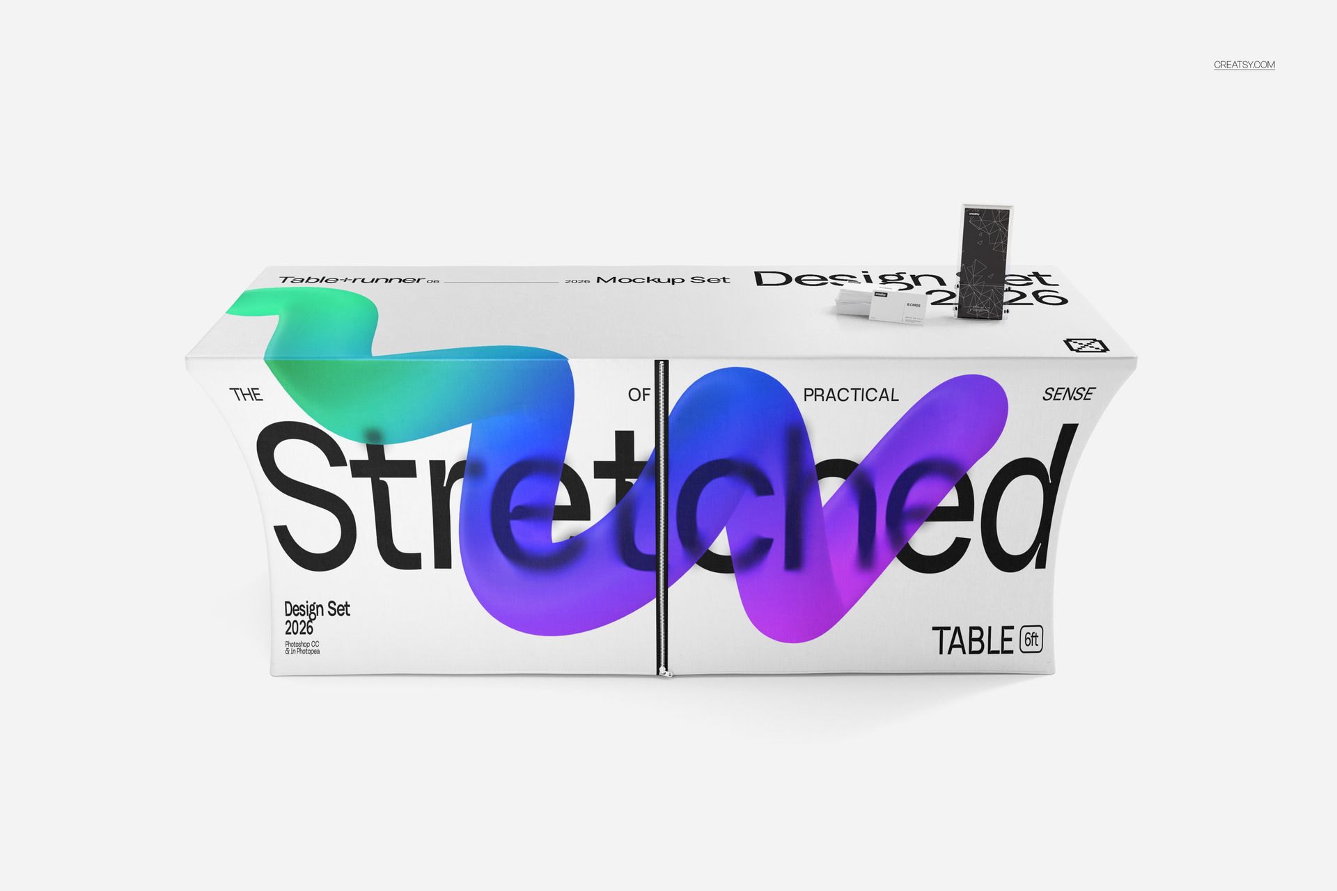 Stretched tablecloth mockup featuring bold blue and purple graphics on a white table, viewed from the front.
