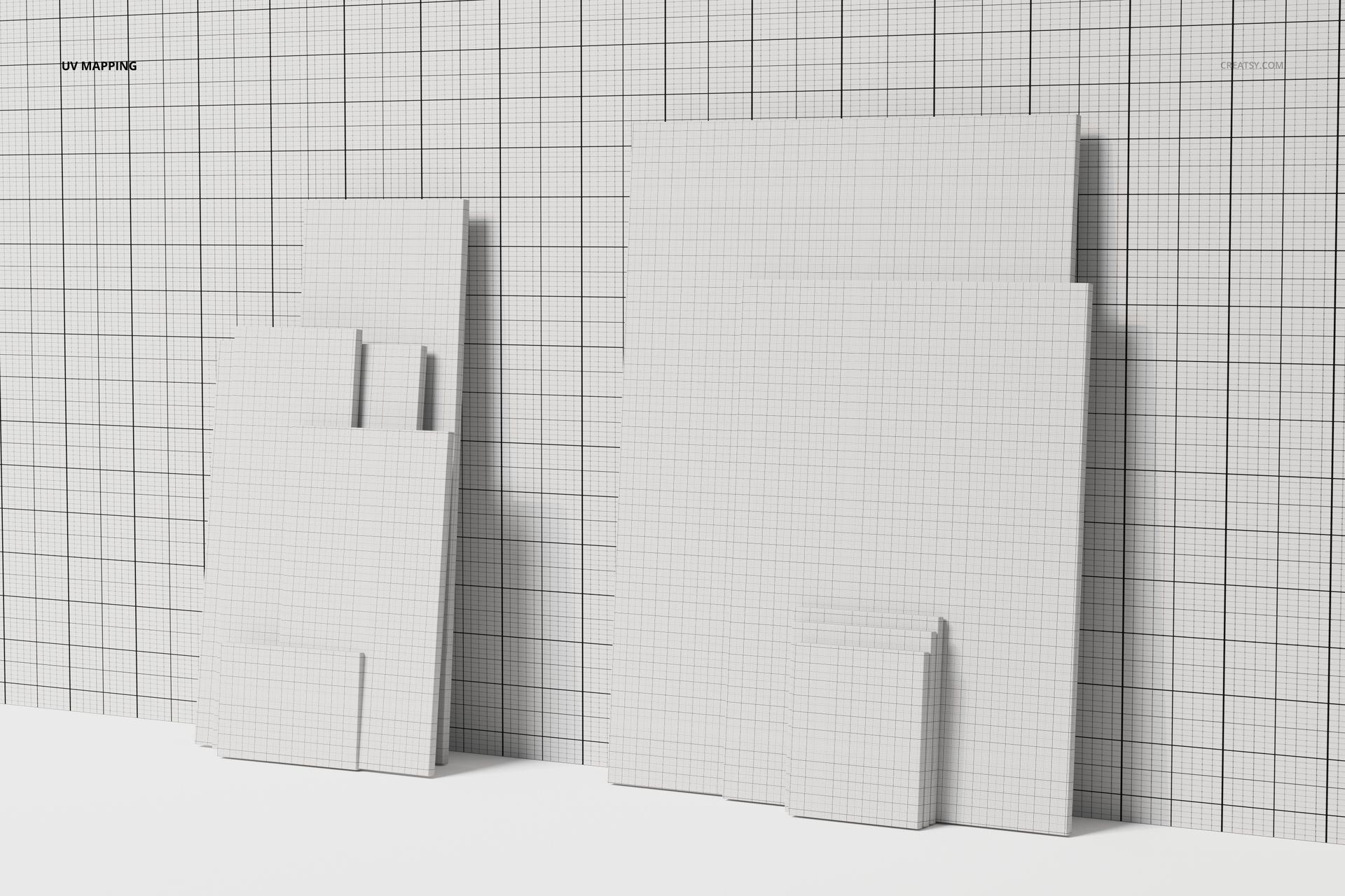 Front view of a canvas variety pack featuring multiple rectangular canvases with grid patterns against a grid wall.