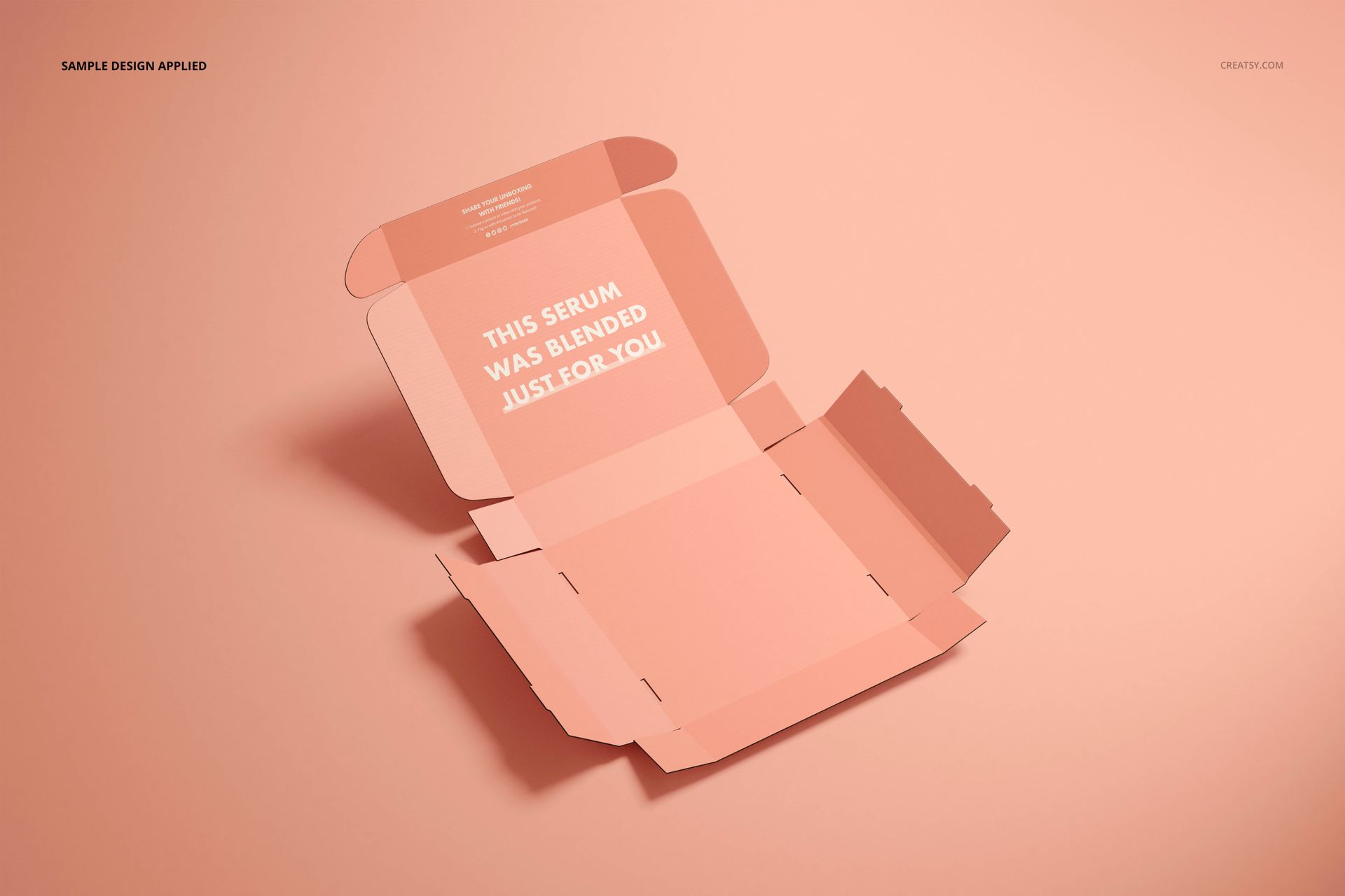 Open cosmetic mailing box mockup displayed on a solid peach background, showing interior and exterior panels.