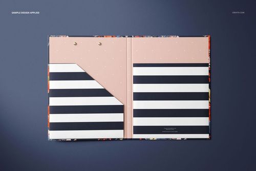 Open stationery folder mockup with pink and black striped design, shown from a top view on a dark background.
