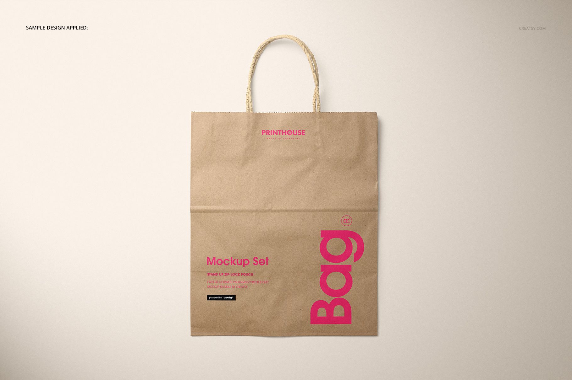 Natural kraft paper shopping bag mockup shown from above, displaying pink design elements and rope handles.