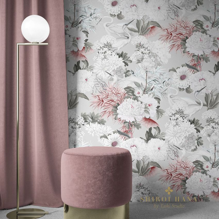 Interior scene mockup showing a pink velvet stool, gold floor lamp with a round bulb, and floral wallpaper with swan motifs.
