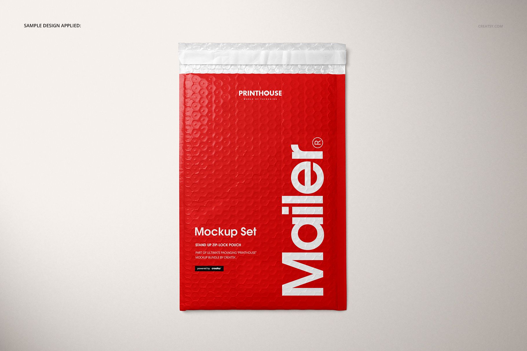 Red bubble mailer mockup displayed flat on a light background, showing a honeycomb texture and white closure.