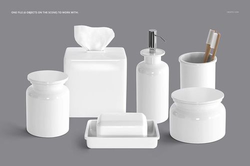 PSD mockup of bathroom accessories in glossy white finish, showing containers, soap dish, and toothbrush holder.