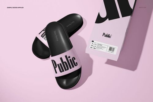 PSD mockup of slide sandals with black soles and pink straps with text, arranged with a branded shoebox on a soft pink setting.