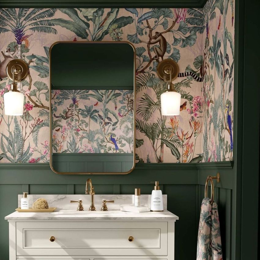 Bathroom mockup featuring a vanity with a marble countertop, gold fixtures, and jungle-themed wallpaper with monkeys and birds.