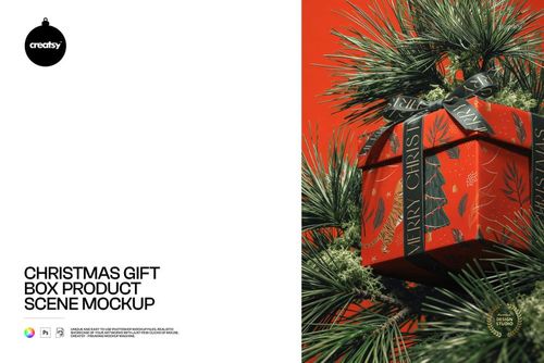 Square Christmas gift box mockup with black satin ribbon, set against pine needles and bright red background.