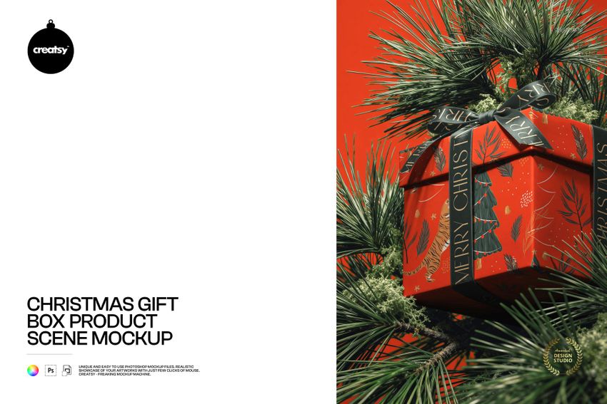 Square Christmas gift box mockup with black satin ribbon, set against pine needles and bright red background.