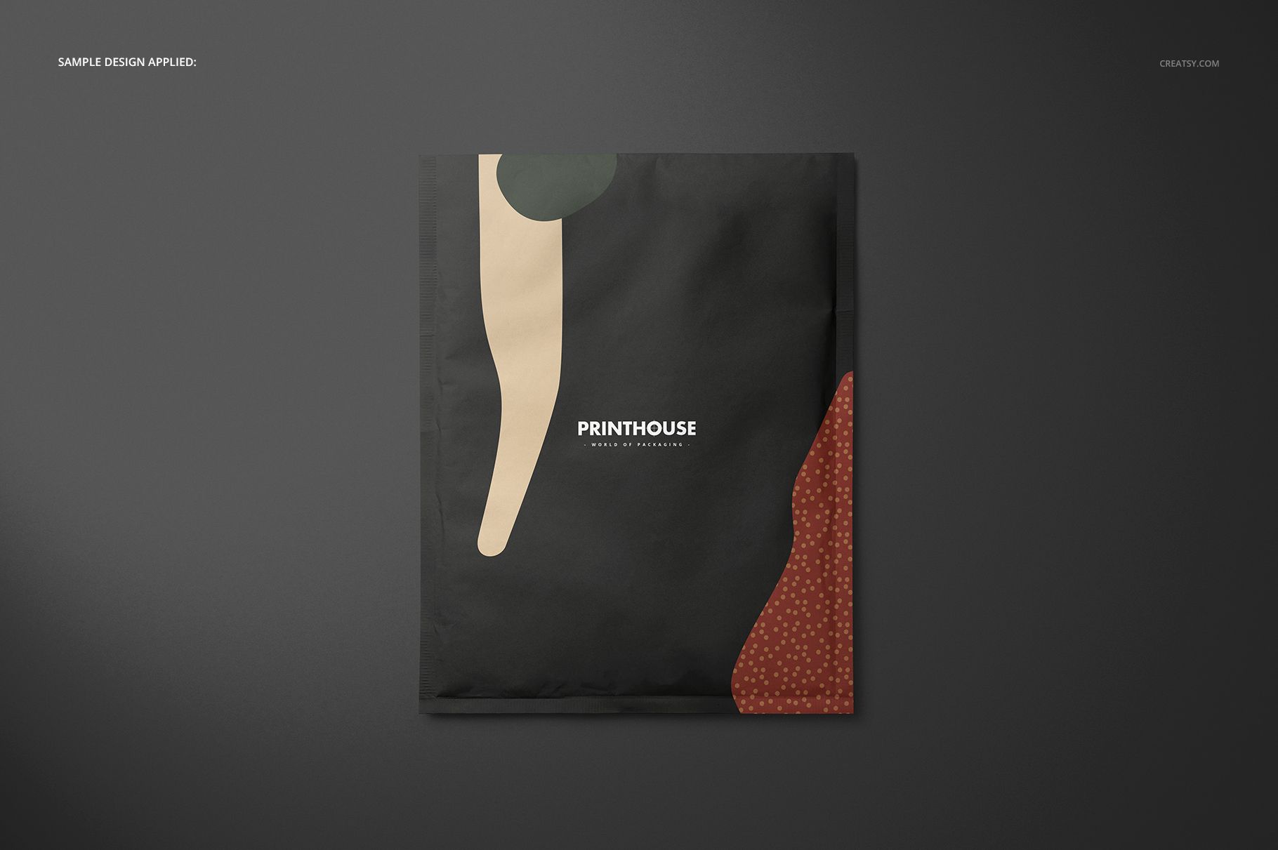 Square envelope mockup with abstract beige and red shapes on a black background, shown from a front view on a dark surface.
