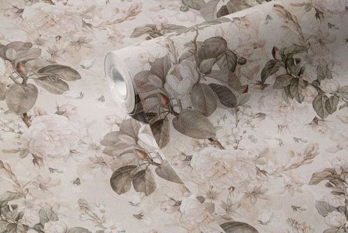 Floral patterned non-woven vinyl wallpaper mockup showing rolled edge and detailed leaves and blossoms, angled view.