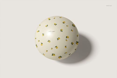Round beach ball mockup with a cream background, decorated with small yellow lemon patterns, shown from above.