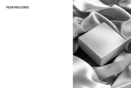 Minimalist square box mockup resting on smooth, shiny silk material with gentle folds, top-down perspective.