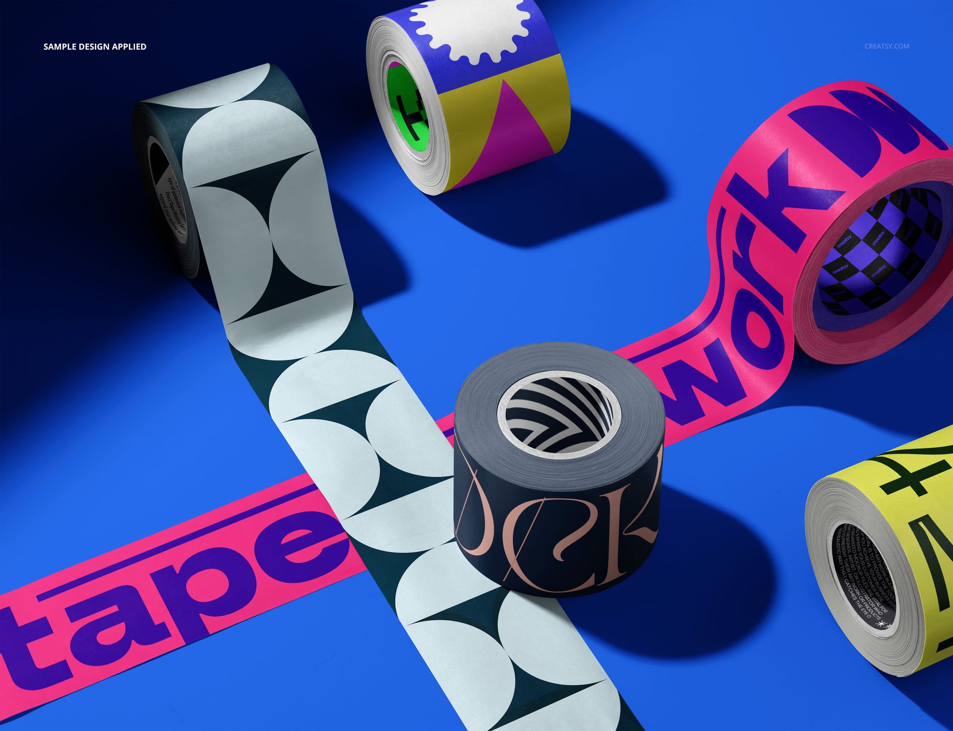 Assorted packaging tape mockup featuring bold patterns and text, arranged on a vibrant blue background.