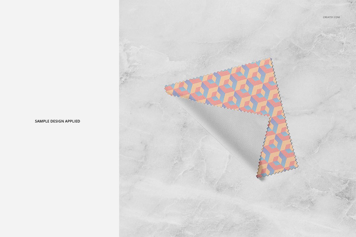 Microfiber glasses cleaning cloth mockup with a colorful geometric pattern, shown on a marble surface, top view.