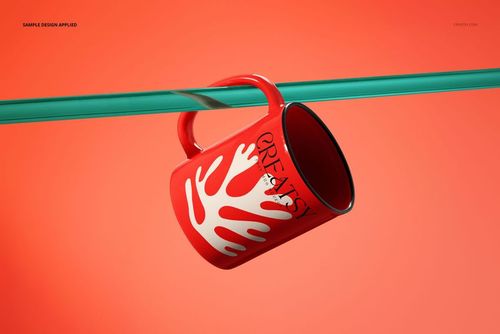 Modern mug mockup featuring a red cup with bold white design, suspended on a clear rod with a vivid orange backdrop.