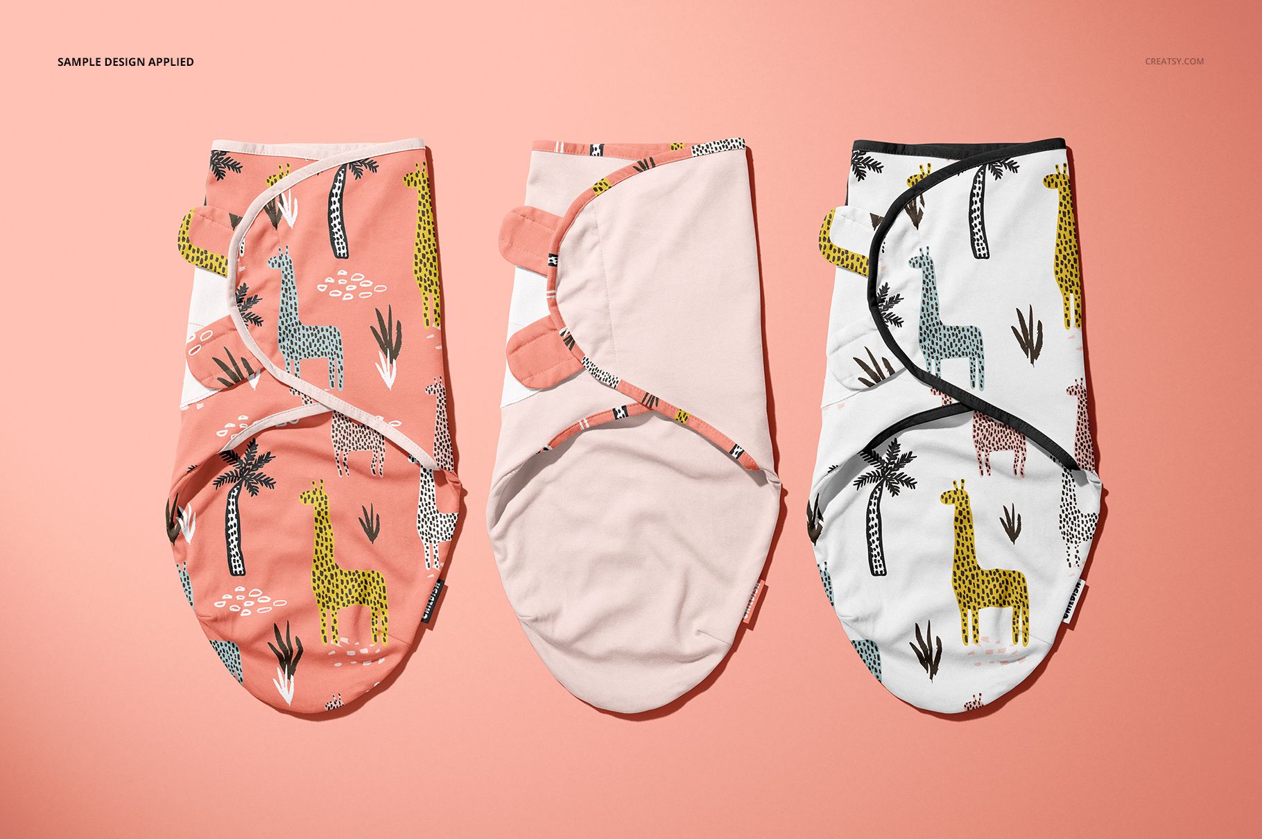 Three adjustable baby swaddle wraps displayed side by side on a flat surface, featuring animal and plant patterns.