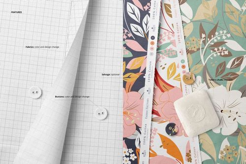Cotton fabric PSD mockup displayed in a fanned arrangement, showing grid and floral designs, buttons, and sewing chalk.