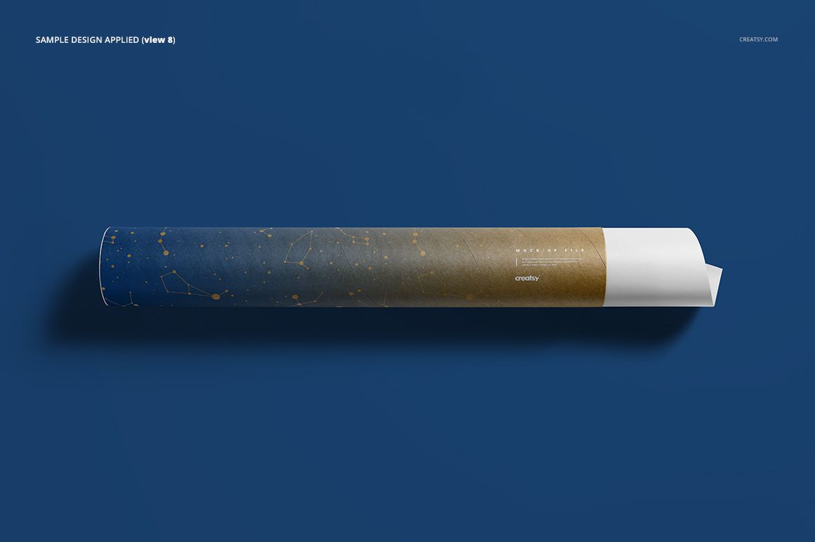 Long cylindrical mailing tube mockup with blue and gold color blocks, shown from a top view on a blue surface.