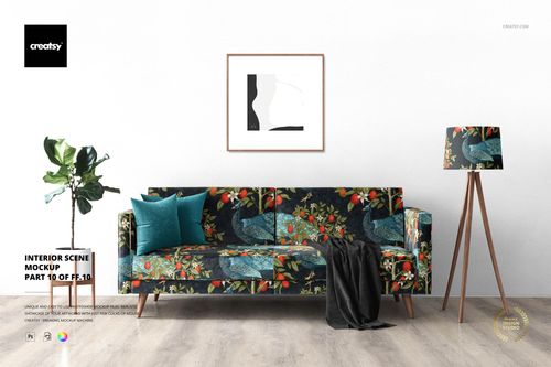 Interior PSD mockup featuring a floral-patterned couch, decorative lamp, framed artwork, and leafy potted plant.