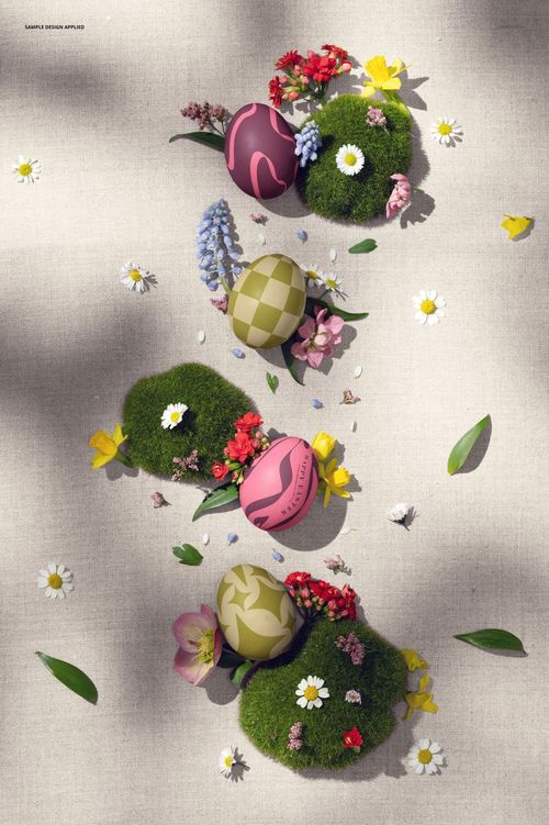 PSD mockup featuring decorated Easter eggs, green moss, and assorted flowers in a top-down scene on neutral cloth.