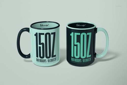 PSD mockup showing a pair of large mugs in mint and black, positioned together to highlight color and design differences.