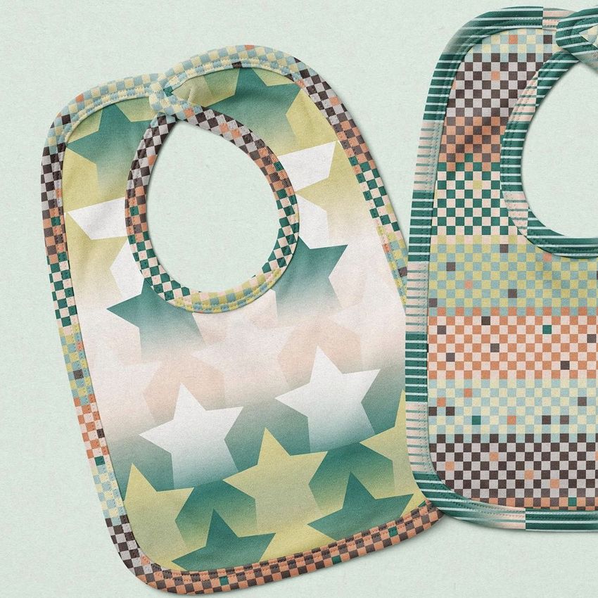 Velcro fastening bib mockup featuring two baby bibs laid flat, one with a star pattern and one with a colorful checkered design.