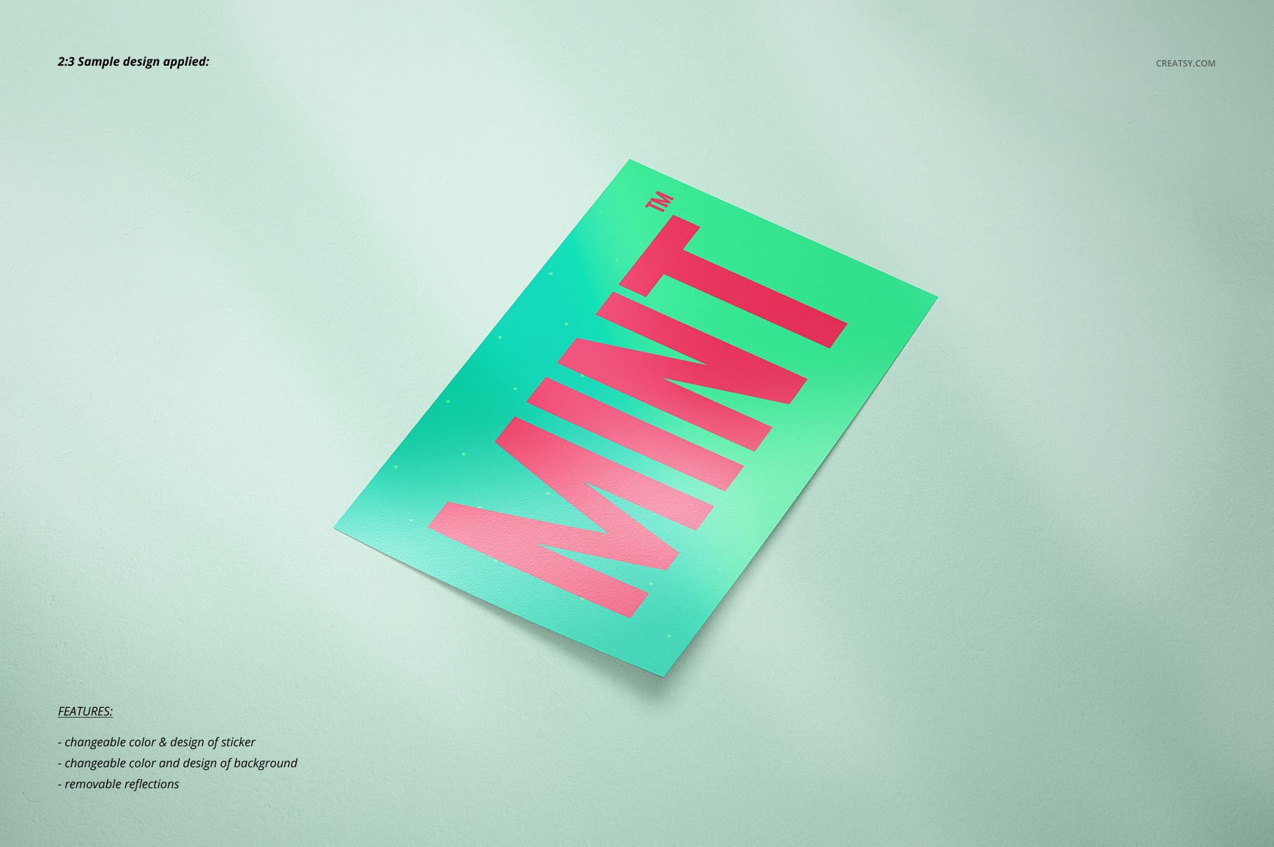 Sticker mockup featuring a green rectangular sticker with large pink lettering, displayed on a pale textured background.