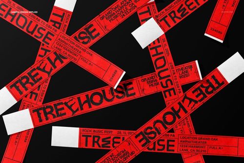 Scattered red paper wristbands with bold black text displayed on a dark surface, shown in a front view mockup.