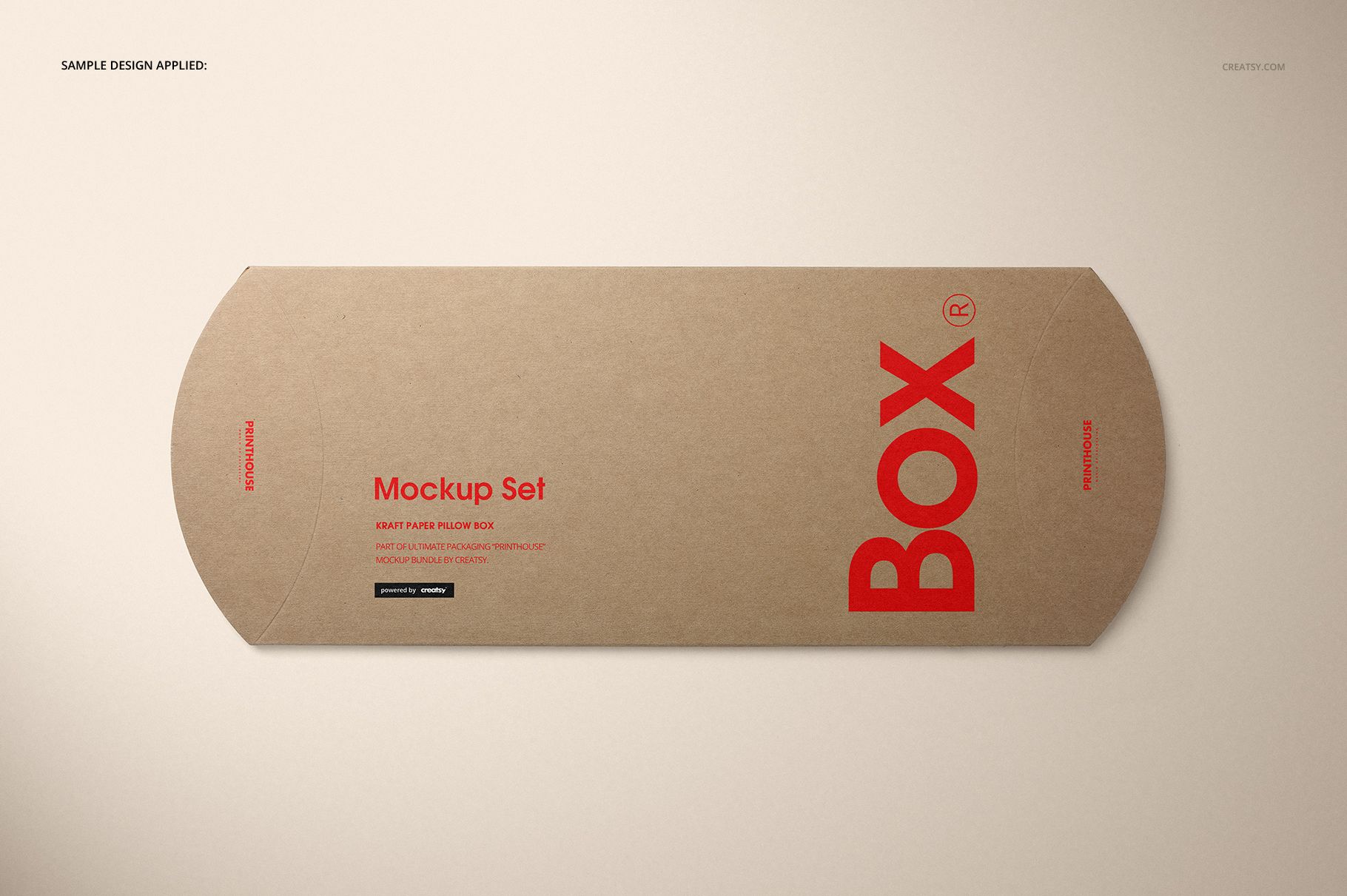 Top view of a rectangular kraft paper pillow box mockup, showing brown surface with red lettering and simple layout.