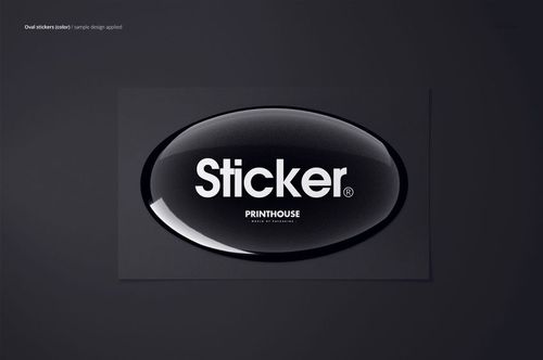 Realistic PSD mockup of an oval epoxy dome sticker with reflective surface and white lettering, centered on gray.