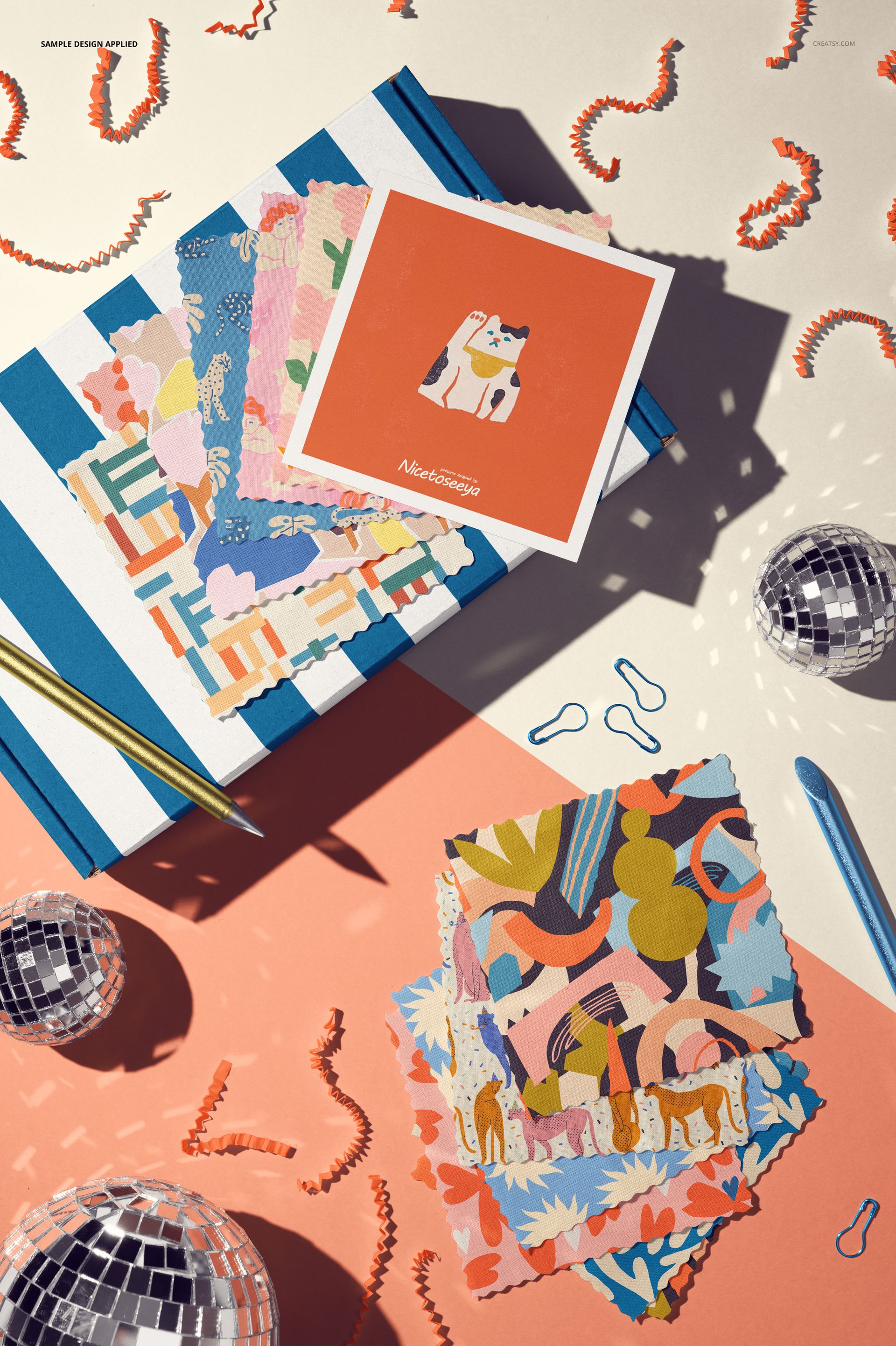 Party-themed cotton swatches mockup displayed flat with geometric and abstract patterns, pens, and small disco balls.