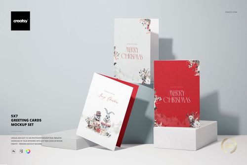 PSD mockup of 5x7 stationery cards with red and white holiday artwork, arranged in a minimal studio scene.