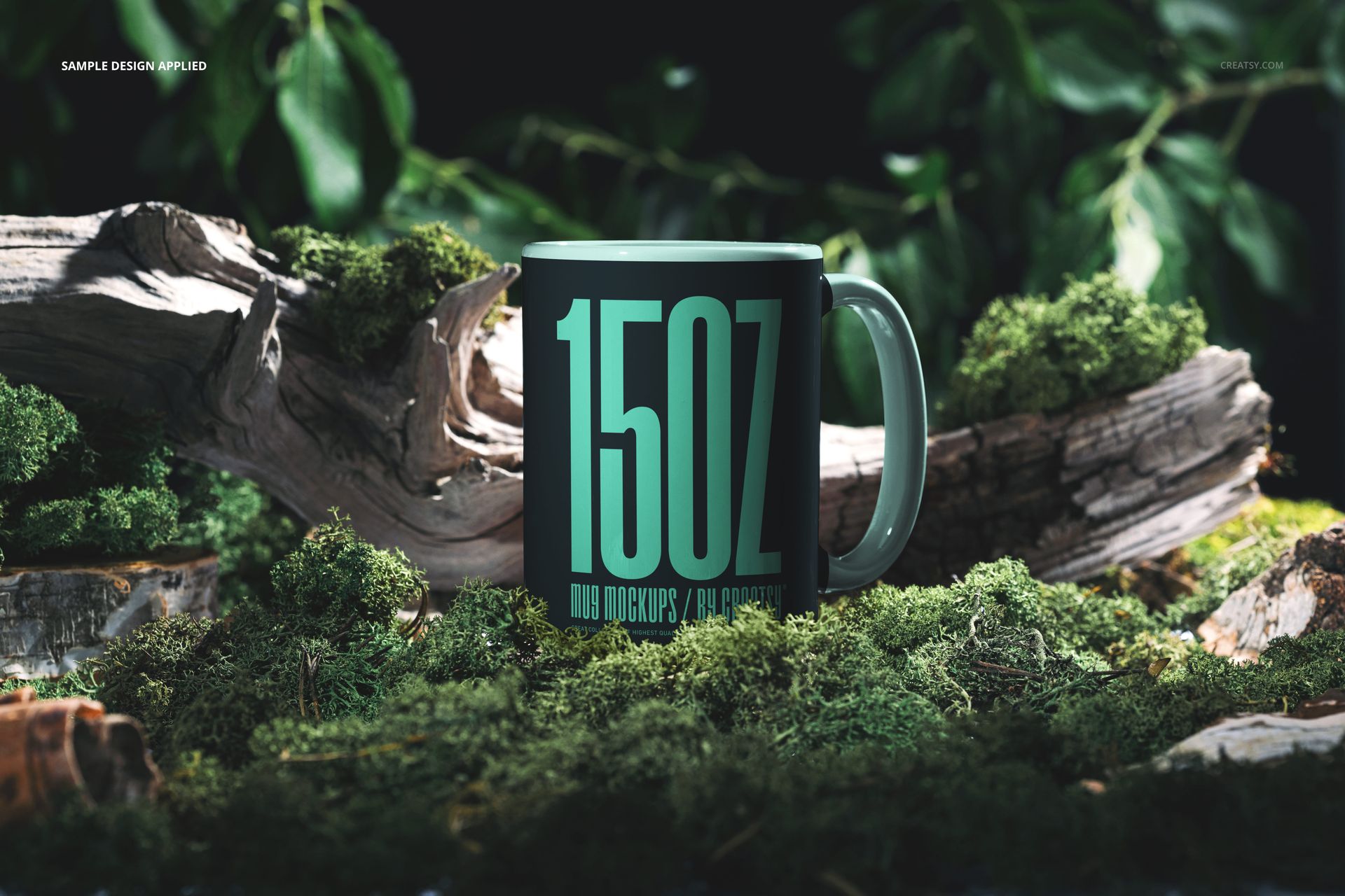 Front view of a 15 oz mug mockup featuring a graphic print, set among lush moss, wood, and leafy greenery.