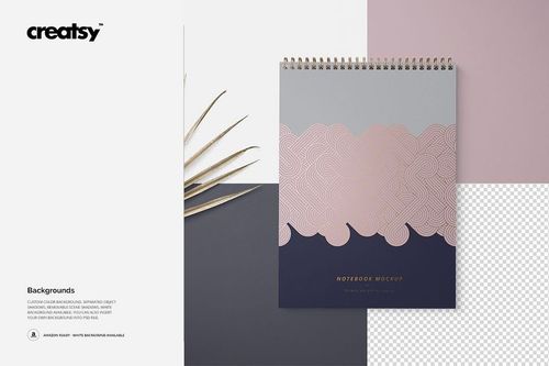 Top view of an A4 spiral notebook mockup with geometric pastel pink, gray, and navy cover design on a white background.