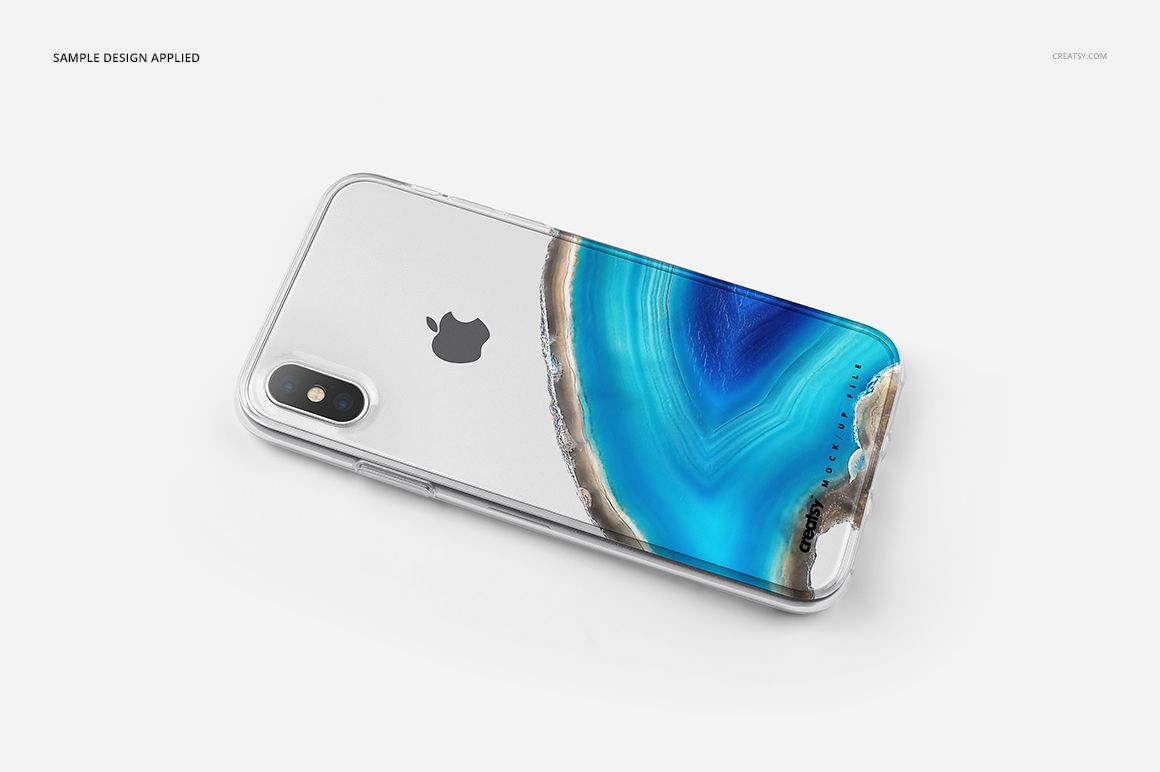 PSD mockup showing a clear iPhone X case featuring a vibrant blue mineral pattern, placed on a white background.