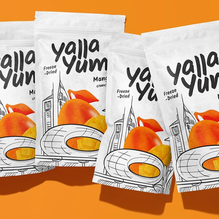 Stand up paper pouch mockup featuring four white pouches with illustrated fruit designs and bold text on an orange background.