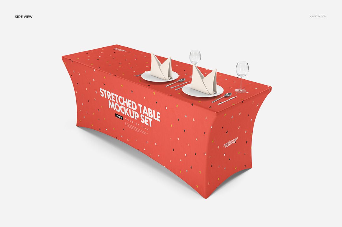 Side view of a red stretched tablecloth mockup featuring subtle patterns, displayed on a dining table with tableware.