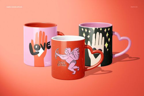 Heart-shaped handle mug PSD mockup set with playful illustrations and bold colors, arranged side by side on a warm background.