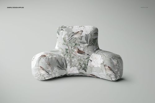 Botanical-themed reading pillow mockup featuring soft floral and bird designs in muted gray and green tones.