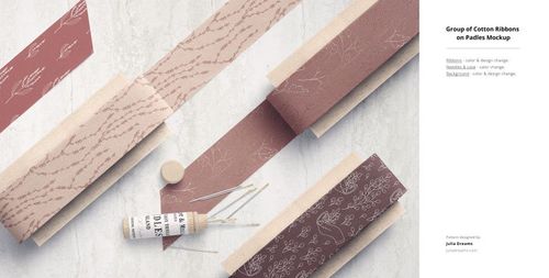 Fabric Factory v.9 PSD mockup showing multiple fabric ribbons in muted pink and brown shades with nature motifs.