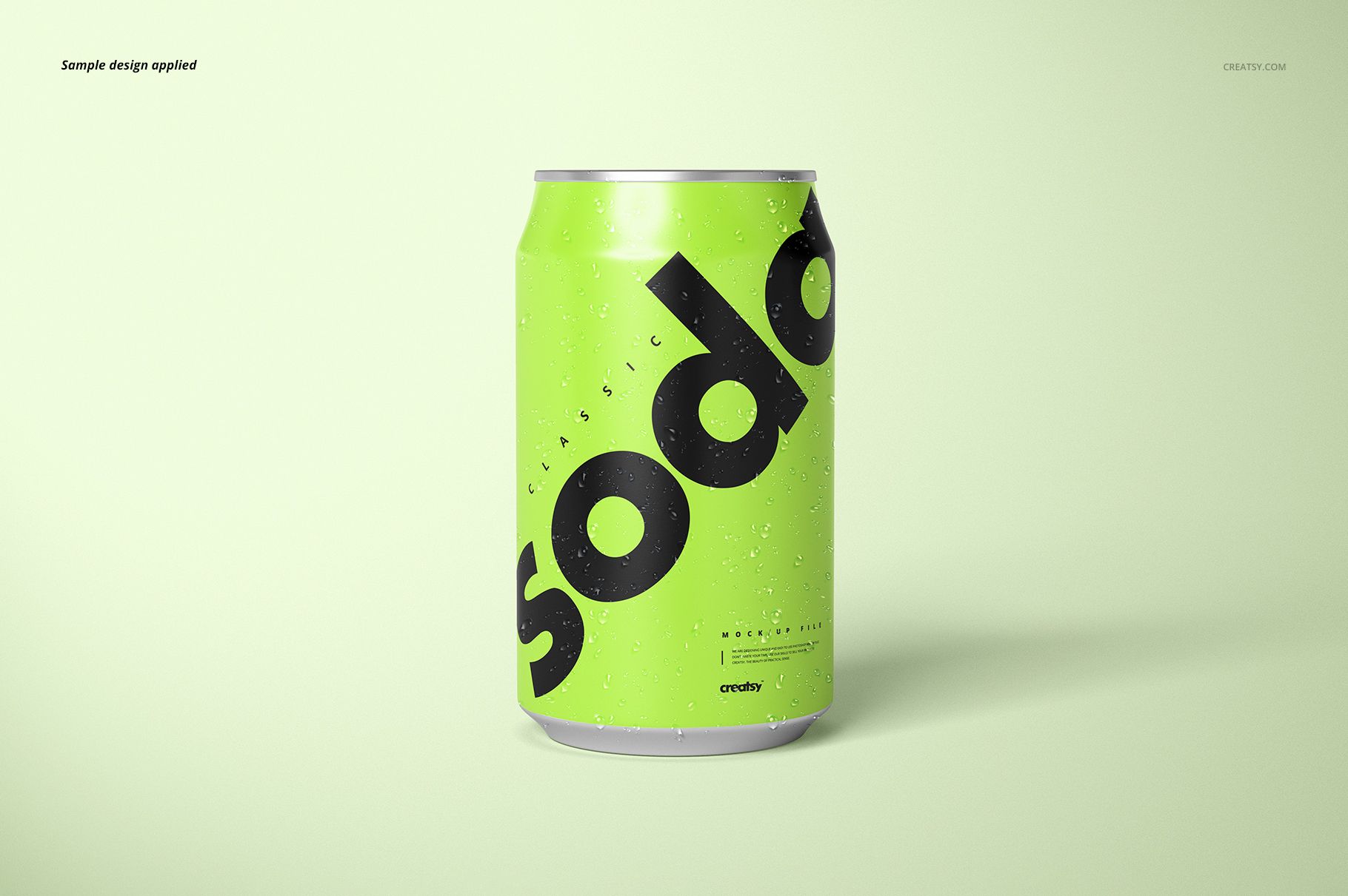 Close-up of a green drink can mockup with large black lettering and condensation, set against a pale surface.