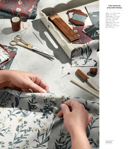 Jersey fabric mockup showing hands working with floral textiles, scissors, ruler, thread, and fabric swatches on a table.