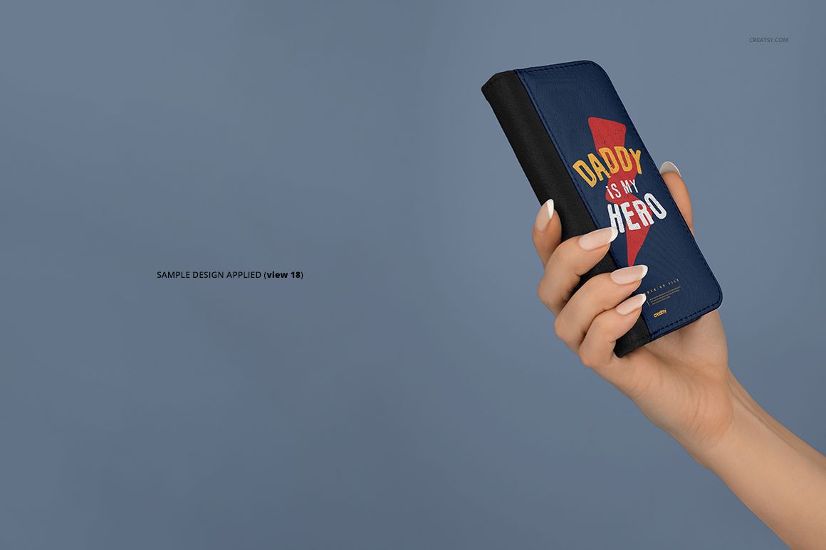 Close-up of a person’s hand displaying a foldable iPhone X case mockup with blue and black colors and graphic text.