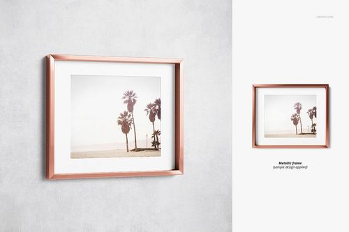 Front view of a picture mockup in a metallic frame featuring a landscape with palm trees and a sandy beach.