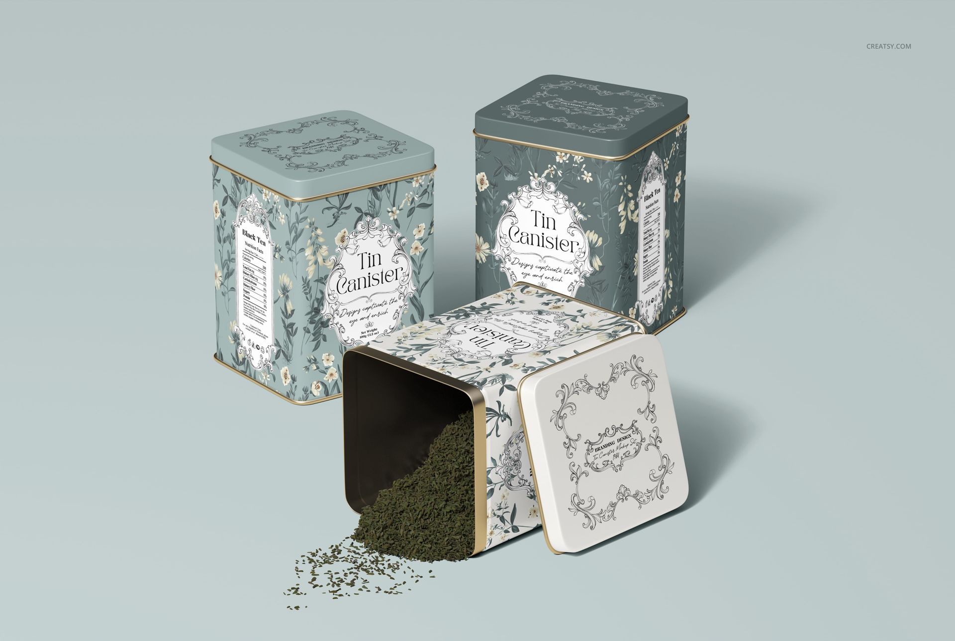 Front and angled view of patterned tin canisters mockup, featuring vintage labels and scattered dried leaves.
