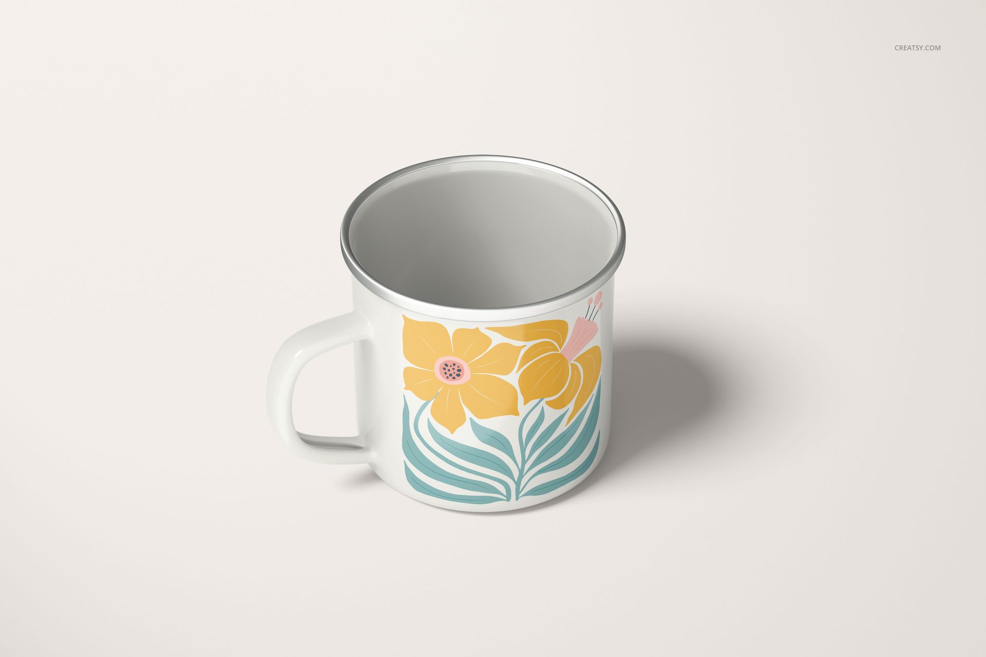 PSD mockup of a 360ml enamel mug with silver rim, decorated with yellow flowers and teal leaves on a light background.