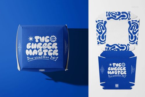 Vegan burger box mockup featuring blue packaging with white graphic designs, displayed from top and flat lay perspectives.