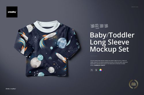 Baby and toddler long sleeve sweatshirt mockup featuring planets and stars, shown from the front on a flat surface.