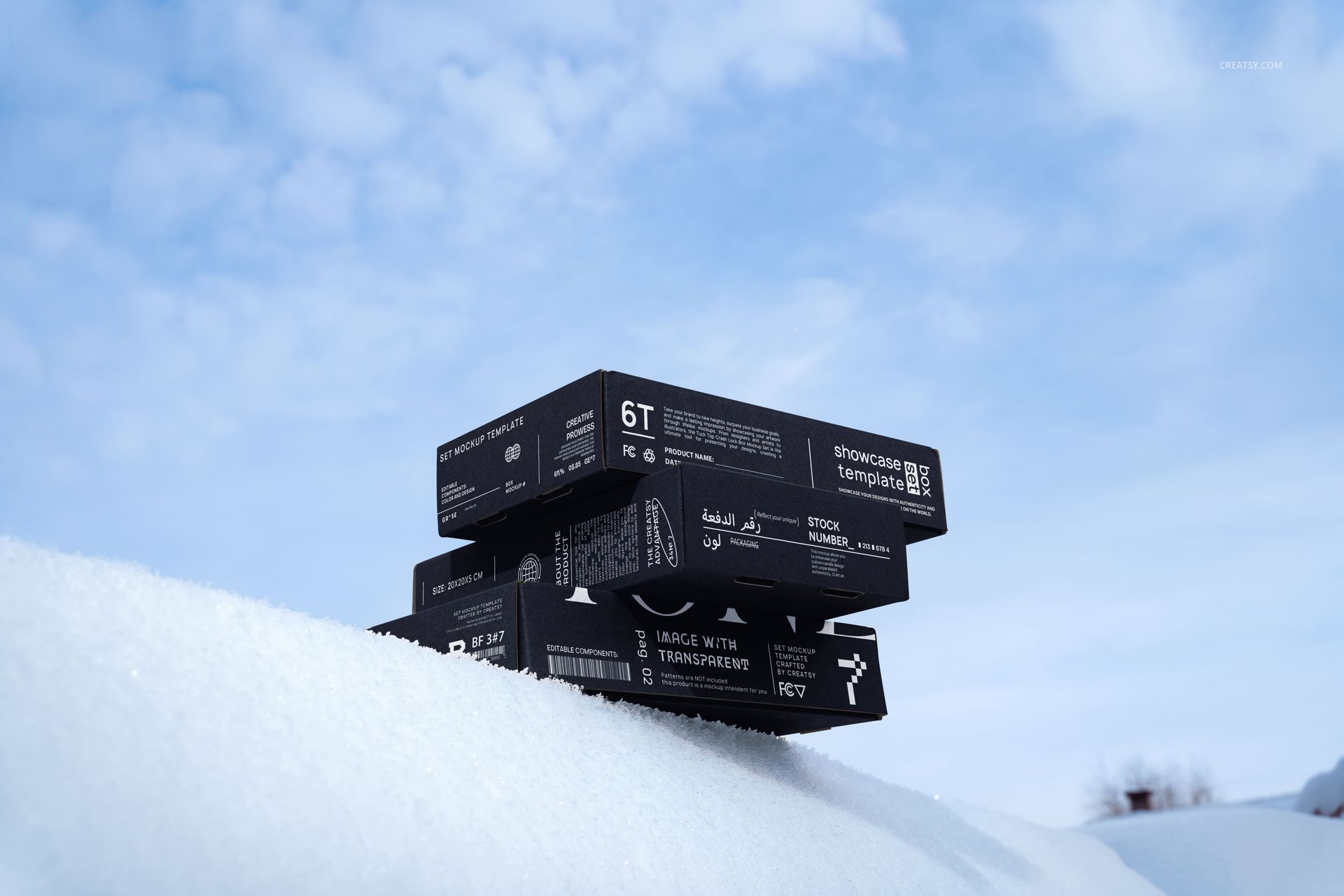 Winter edition packaging mockup featuring multiple black boxes on a snowy surface, viewed from the side outdoors.