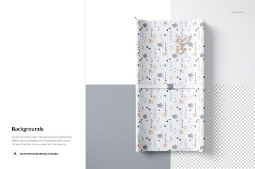 Top view of a rectangular changing pad mockup with soft floral pattern, placed on a divided background.